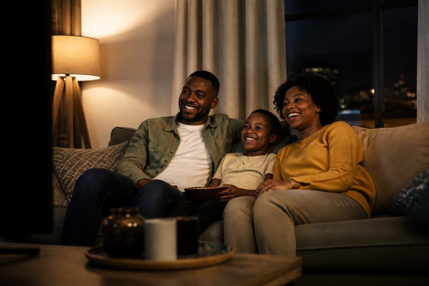 South African family watching TV